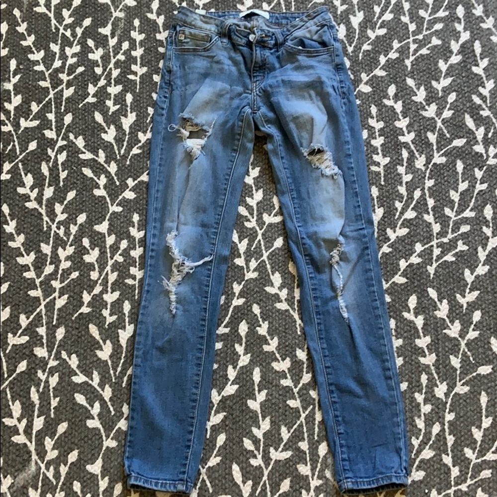 stressed, light wash jeans. Great condition!